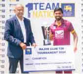NCC skipper Niroshan Dickwella receiving the champions trophy from SLC tournament committee member Deepal Madurapperuma (Photo courtesy of SLC)